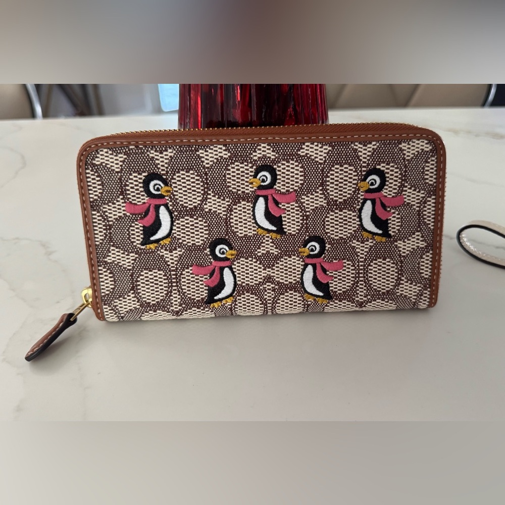 Coach Brown and Cream Wallet with Penguin Design